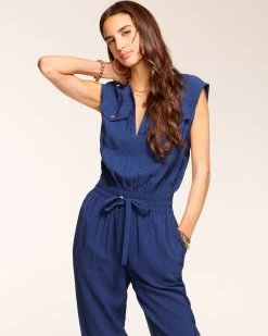 Bria Smocked Jumpsuit 16 Bria Smocked Jumpsuit -Urban Chic Shop rtw 2023 may 1 A05235012 BRIAJUMPSUIT SPRING NAVY 01