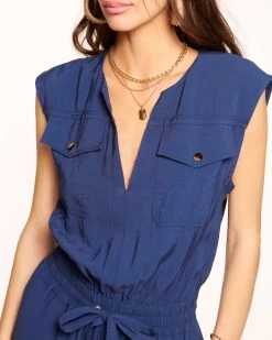 Bria Smocked Jumpsuit 18 Bria Smocked Jumpsuit -Urban Chic Shop rtw 2023 may 1 A05235012 BRIAJUMPSUIT SPRING NAVY 03